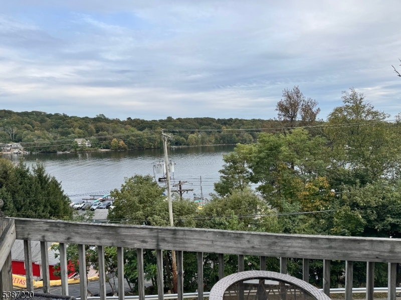 8 Hopatcong Street Hopatcong, NJ 07821 - Photo 9 of 22 a view of a lake with a mountain view