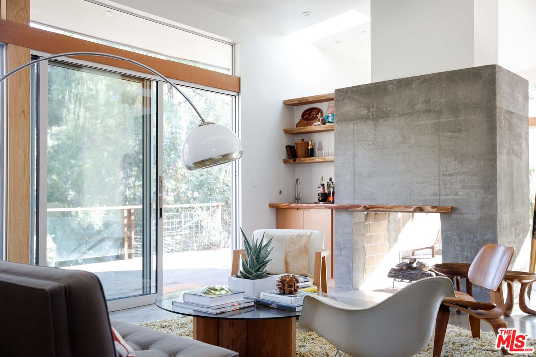 7500 Devista Drive Los Angeles, CA 90046 - Photo 11 of 43 a living room with furniture and a large window