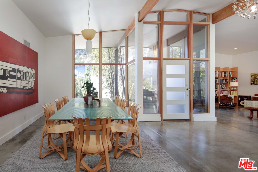 7500 Devista Drive Los Angeles, CA 90046 - Photo 16 of 43 a dining room with furniture and wooden floor