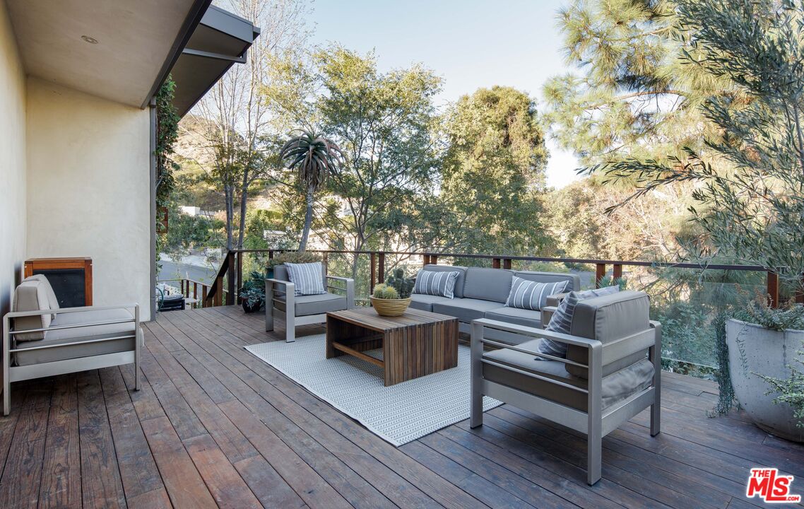7500 Devista Drive Los Angeles, CA 90046 - Photo 22 of 43 a outdoor living space with furniture and a fireplace