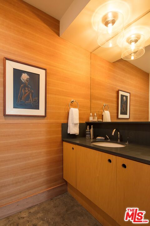 7500 Devista Drive Los Angeles, CA 90046 - Photo 30 of 43 a bathroom with a sink and a mirror