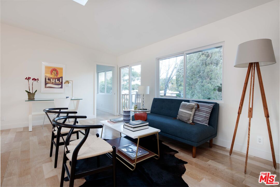 7500 Devista Drive Los Angeles, CA 90046 - Photo 32 of 43 a living room with furniture and a wooden floor
