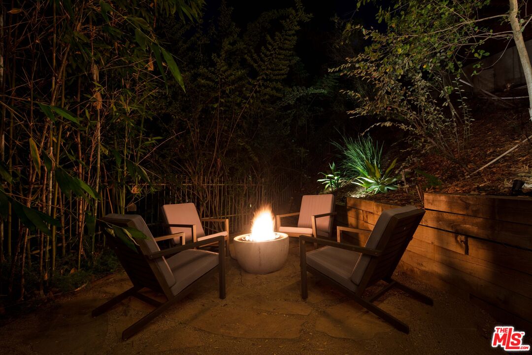 7500 Devista Drive Los Angeles, CA 90046 - Photo 36 of 43 a view of a patio with couches and potted plants