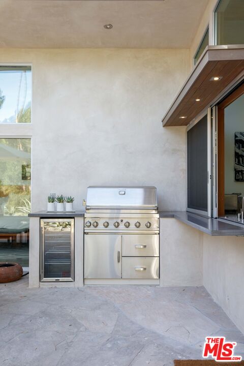 7500 Devista Drive Los Angeles, CA 90046 - Photo 38 of 43 a kitchen with stove and cabinets