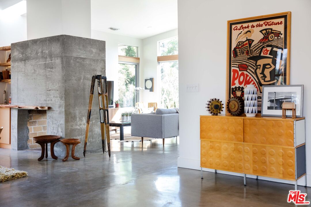 7500 Devista Drive Los Angeles, CA 90046 - Photo 39 of 43 a living room with furniture and wooden floor