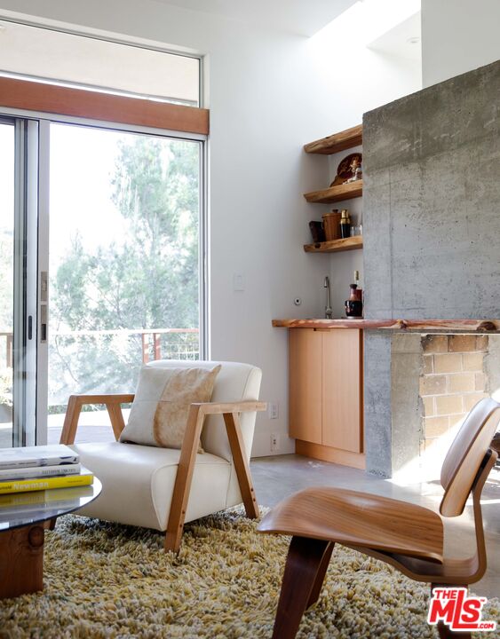 7500 Devista Drive Los Angeles, CA 90046 - Photo 40 of 43 a living room with a couch and a table