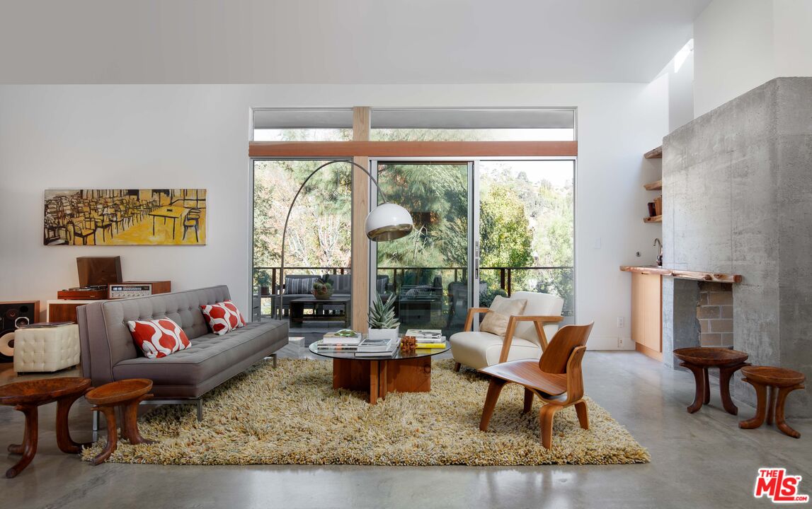 7500 Devista Drive Los Angeles, CA 90046 - Photo 9 of 43 a living room with furniture and a large window