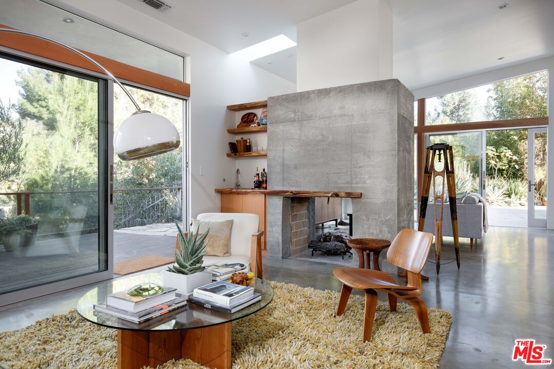 7500 Devista Drive Los Angeles, CA 90046 - Photo 10 of 43 a living room with furniture and a large window