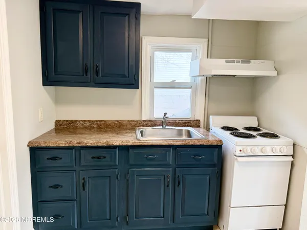 a utility room with washer and dryer