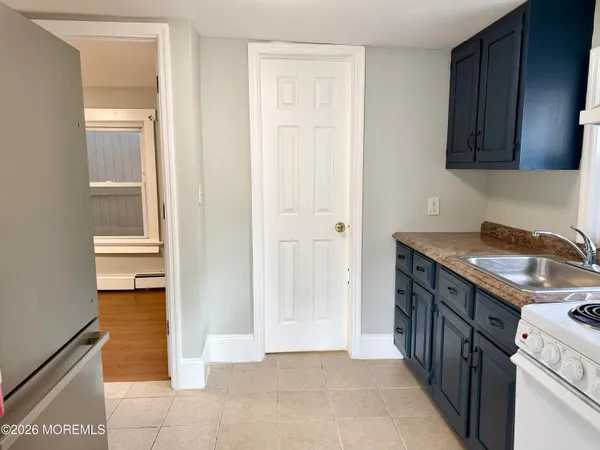 a kitchen with stainless steel appliances granite countertop a stove and a sink