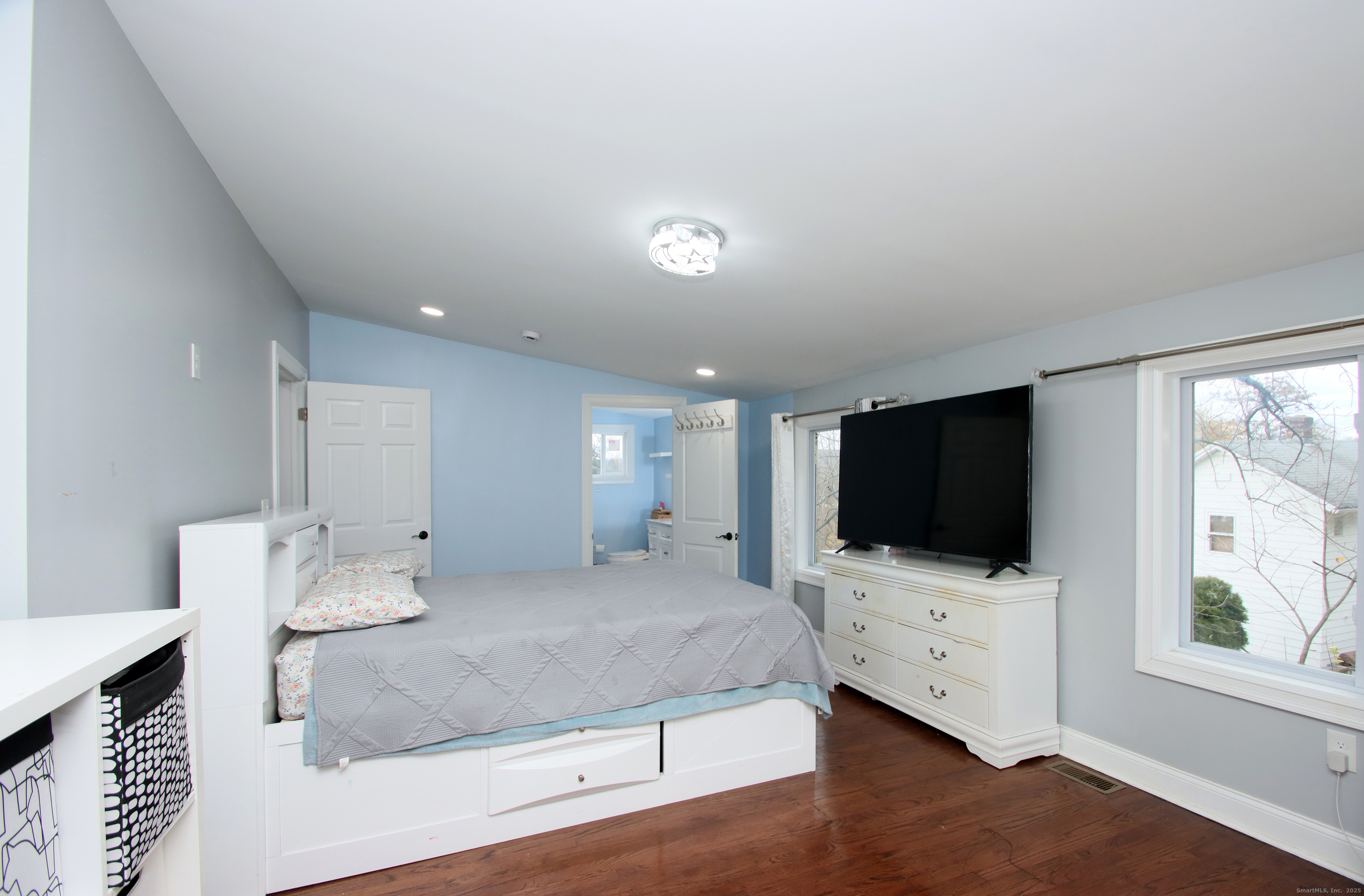 32 Spring Street Ansonia, CT 06401 - Photo 15 of 34 a living room with furniture and a flat screen tv