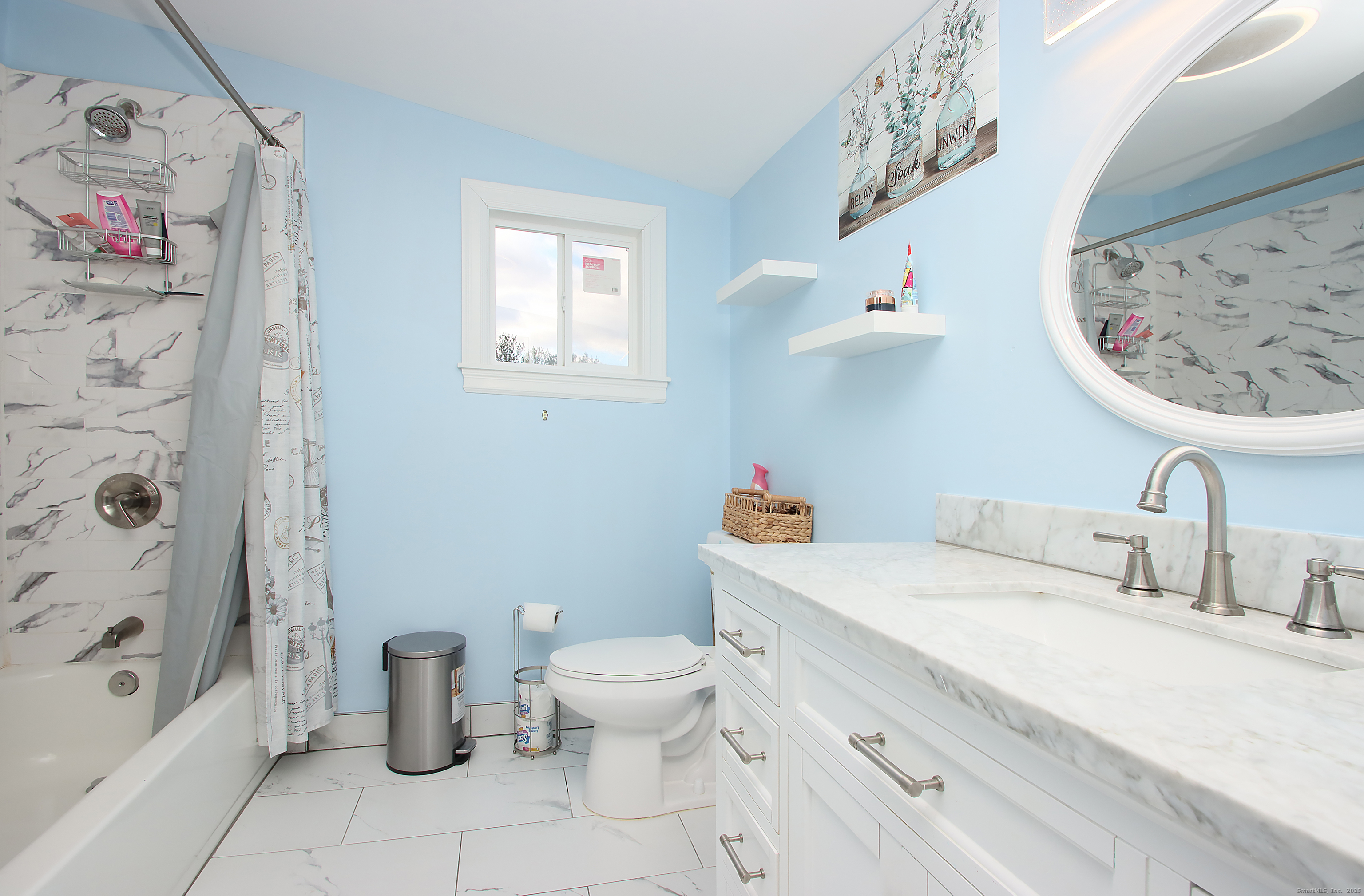 32 Spring Street Ansonia, CT 06401 - Photo 24 of 34 a bathroom with a sink toilet and shower