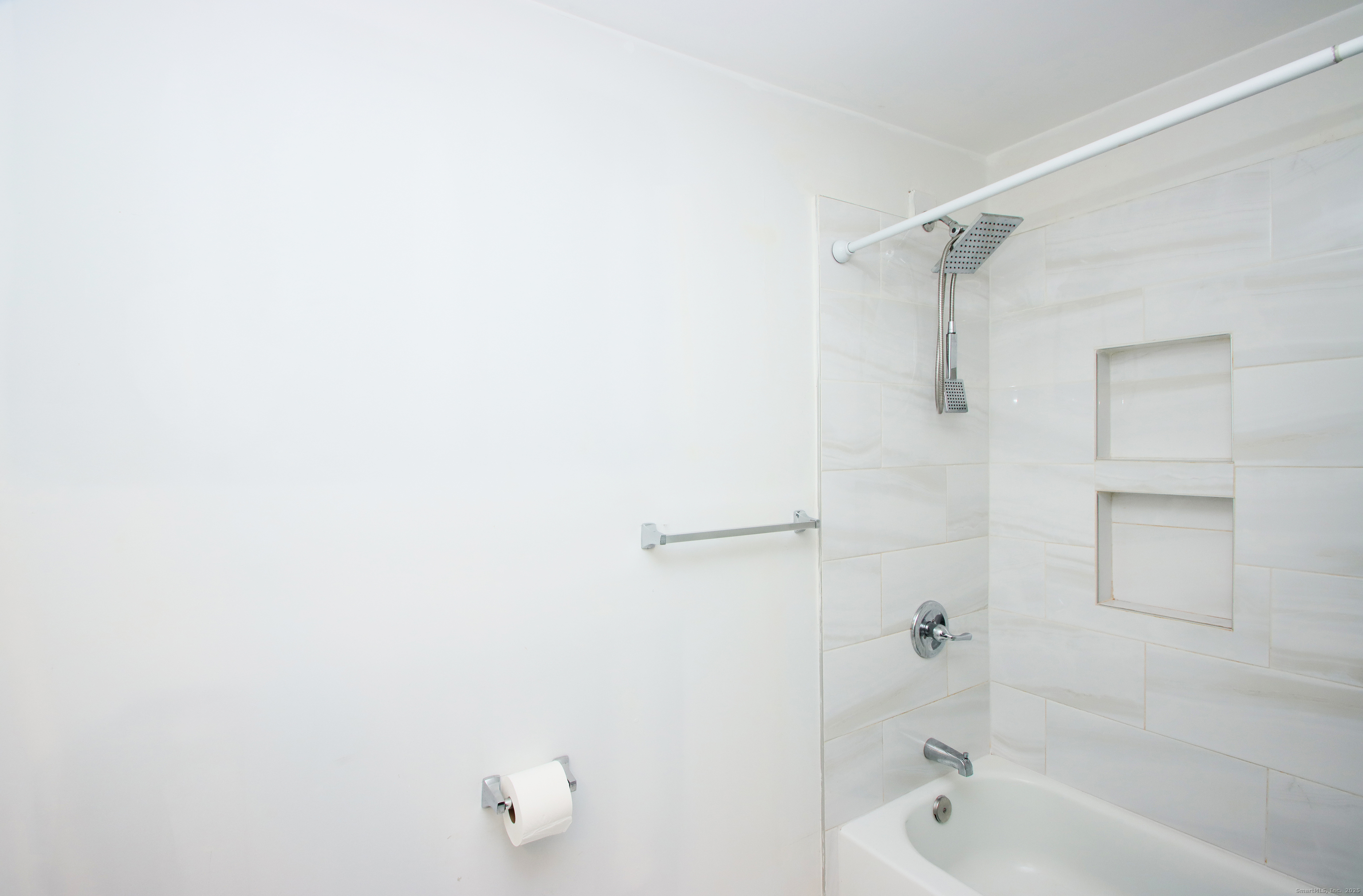 32 Spring Street Ansonia, CT 06401 - Photo 26 of 34 a bathroom with a bathtub