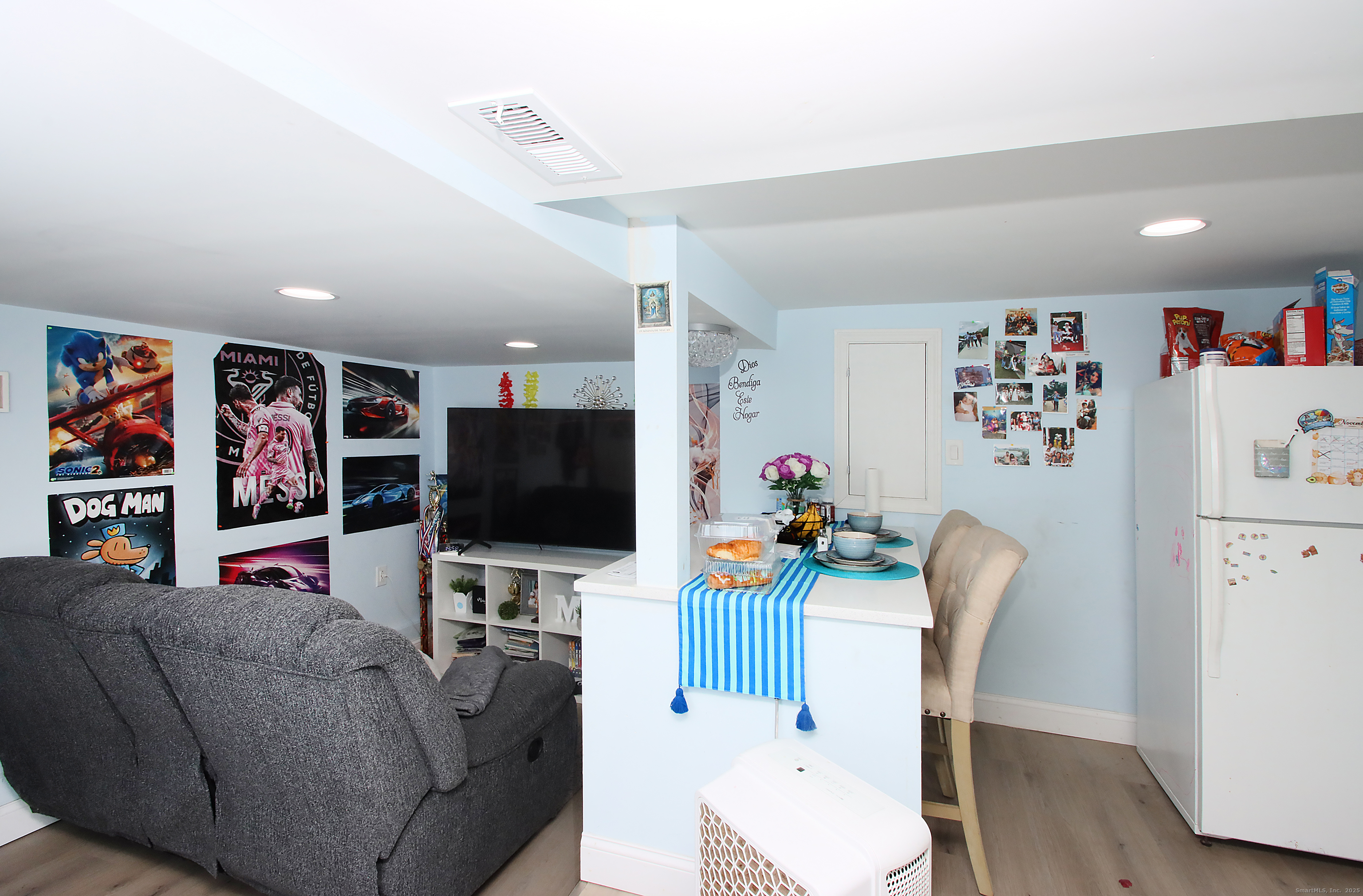 32 Spring Street Ansonia, CT 06401 - Photo 32 of 34 a living room with furniture and wooden floor