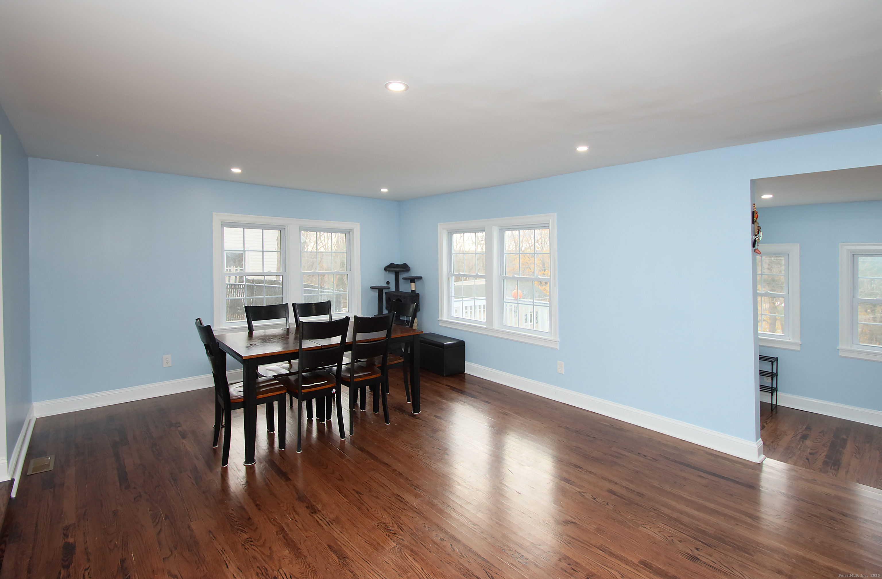 32 Spring Street Ansonia, CT 06401 - Photo 5 of 34 a view of a dining room with furniture and wooden floor