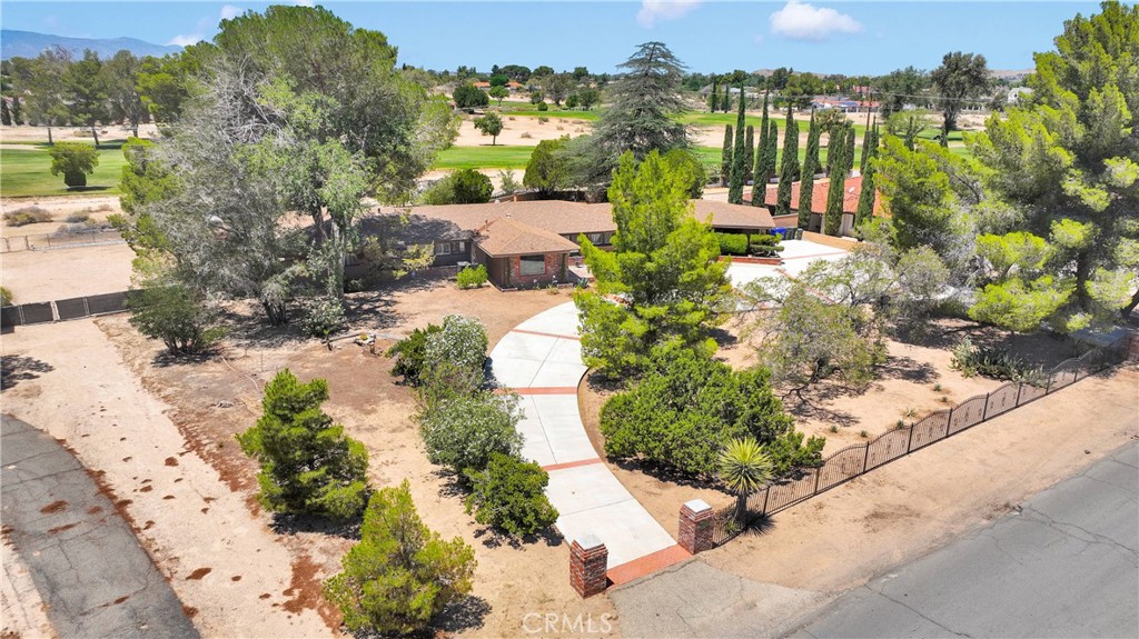 19955 Chickasaw Road Apple Valley, CA 92307 - Photo 51 of 60 a view of a houses with a street