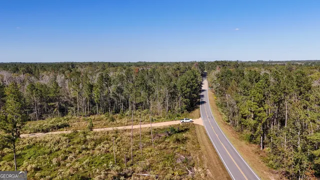 a view of a yard from a balcony