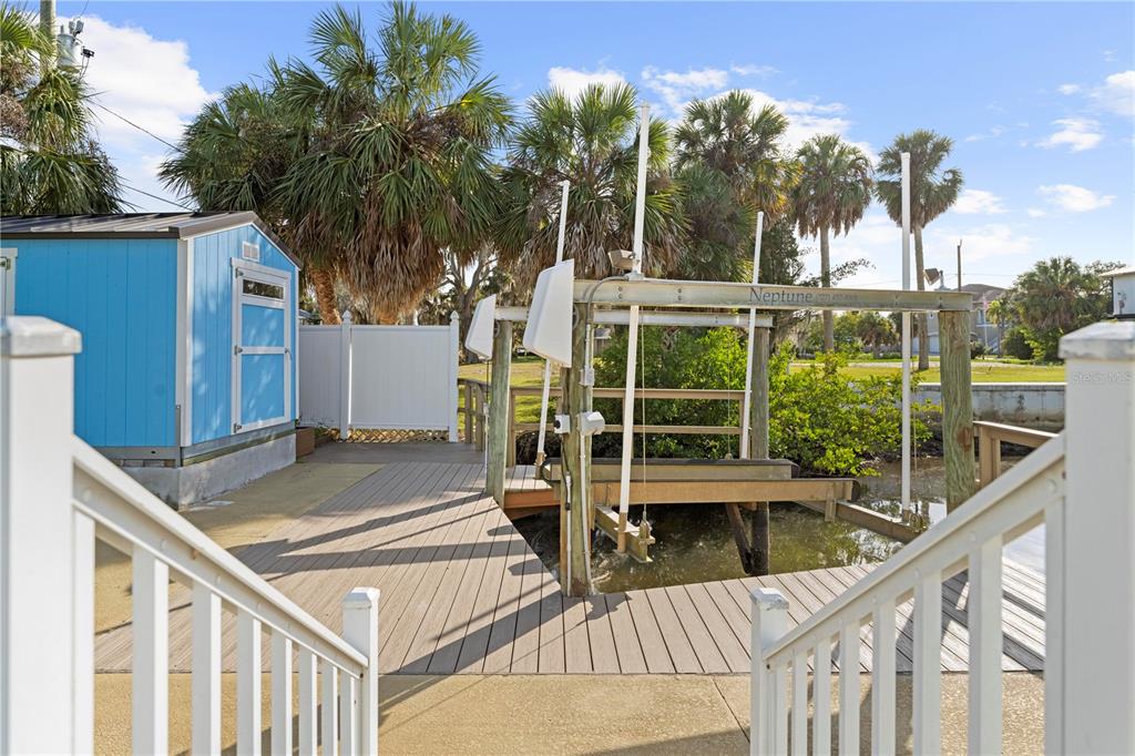5446 Bluepoint Drive Port Richey, FL 34668 - Photo 18 of 68 a view of a house with a swimming pool