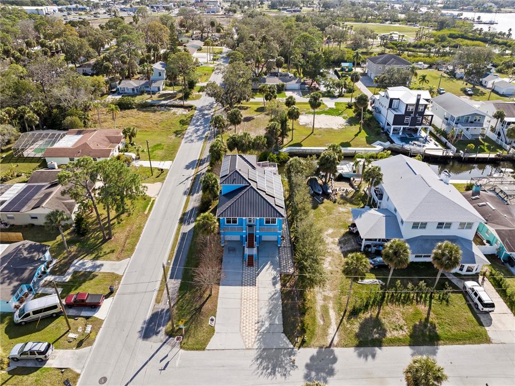 5446 Bluepoint Drive Port Richey, FL 34668 - Photo 2 of 68 an aerial view of residential houses with outdoor space