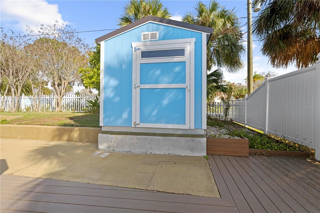 5446 Bluepoint Drive Port Richey, FL 34668 - Photo 22 of 68 a front view of a house with a yard