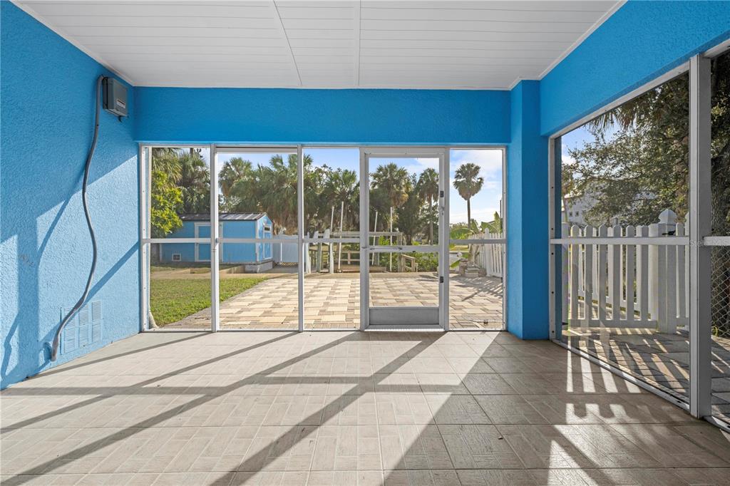 5446 Bluepoint Drive Port Richey, FL 34668 - Photo 24 of 68 a view of backyard with window and swimming pool