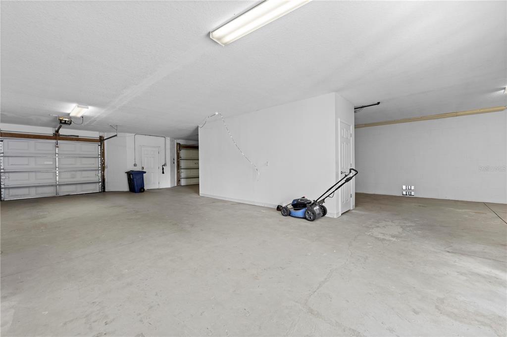 5446 Bluepoint Drive Port Richey, FL 34668 - Photo 25 of 68 a view of a room with gym equipment