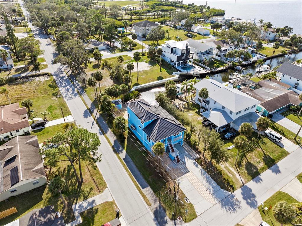 5446 Bluepoint Drive Port Richey, FL 34668 - Photo 4 of 68 an aerial view of a house with a yard