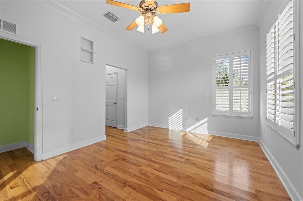 5446 Bluepoint Drive Port Richey, FL 34668 - Photo 52 of 68 a view of a livingroom with wooden floor and a window