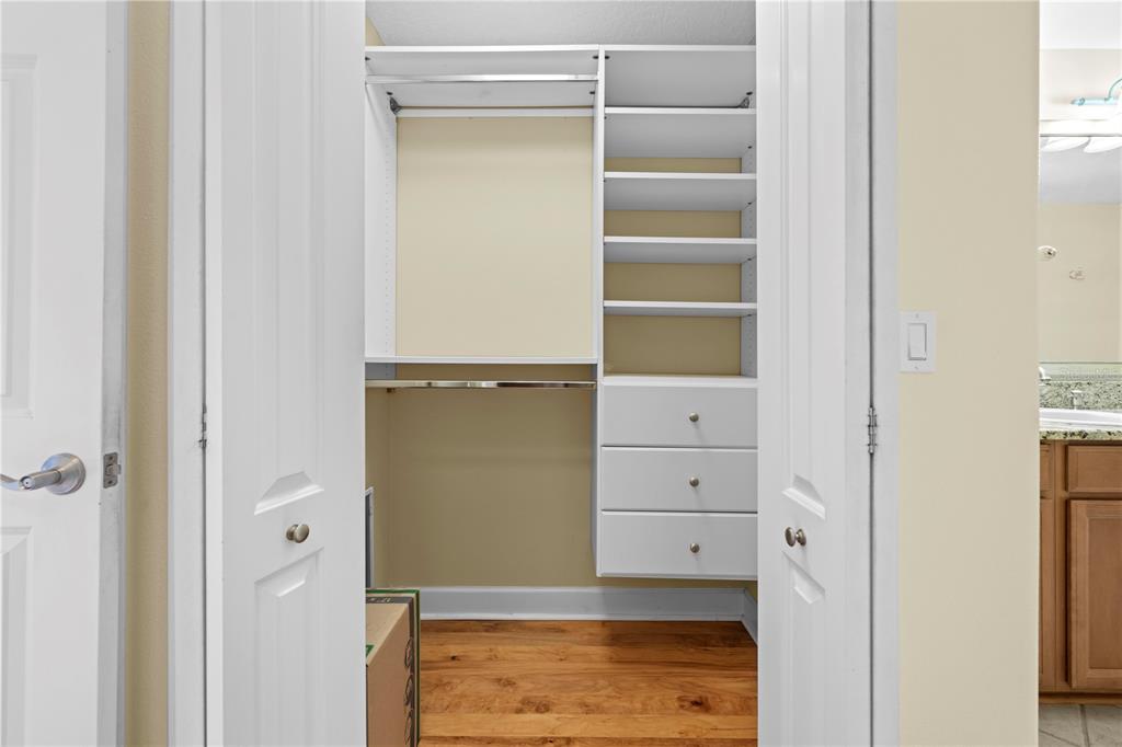 5446 Bluepoint Drive Port Richey, FL 34668 - Photo 62 of 68 a view of an empty walk in closet