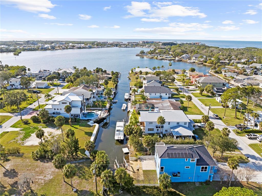 5446 Bluepoint Drive Port Richey, FL 34668 - Photo 8 of 68 an aerial view of residential building with outdoor space and ocean view