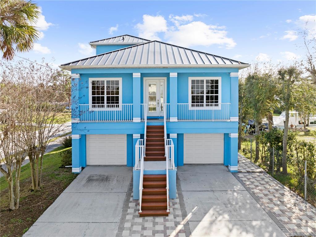5446 Bluepoint Drive Port Richey, FL 34668 - Photo 9 of 68 front view of a house