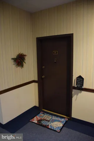 a living room with a wooden floor