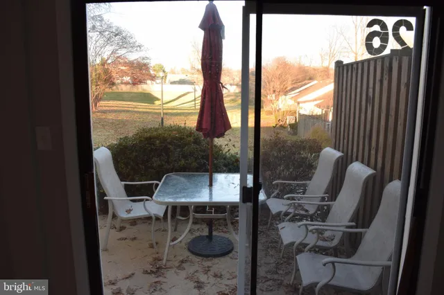 a workspace with furniture and a window