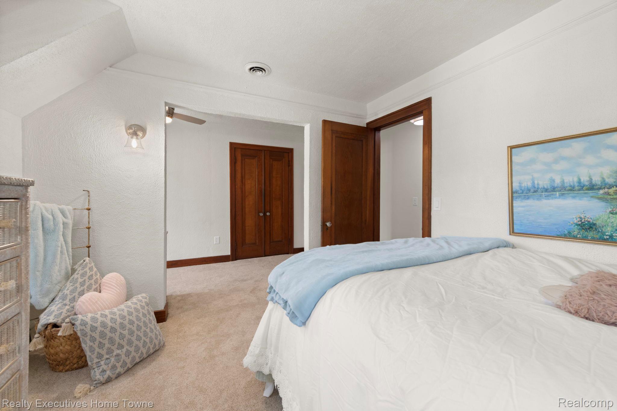 8308 Lakeshore Road Fort Gratiot, MI 48059 - Photo 59 of 79 Carpeted room featuring a ceiling fan, recessed lighting, and a wall-mounted light fixture