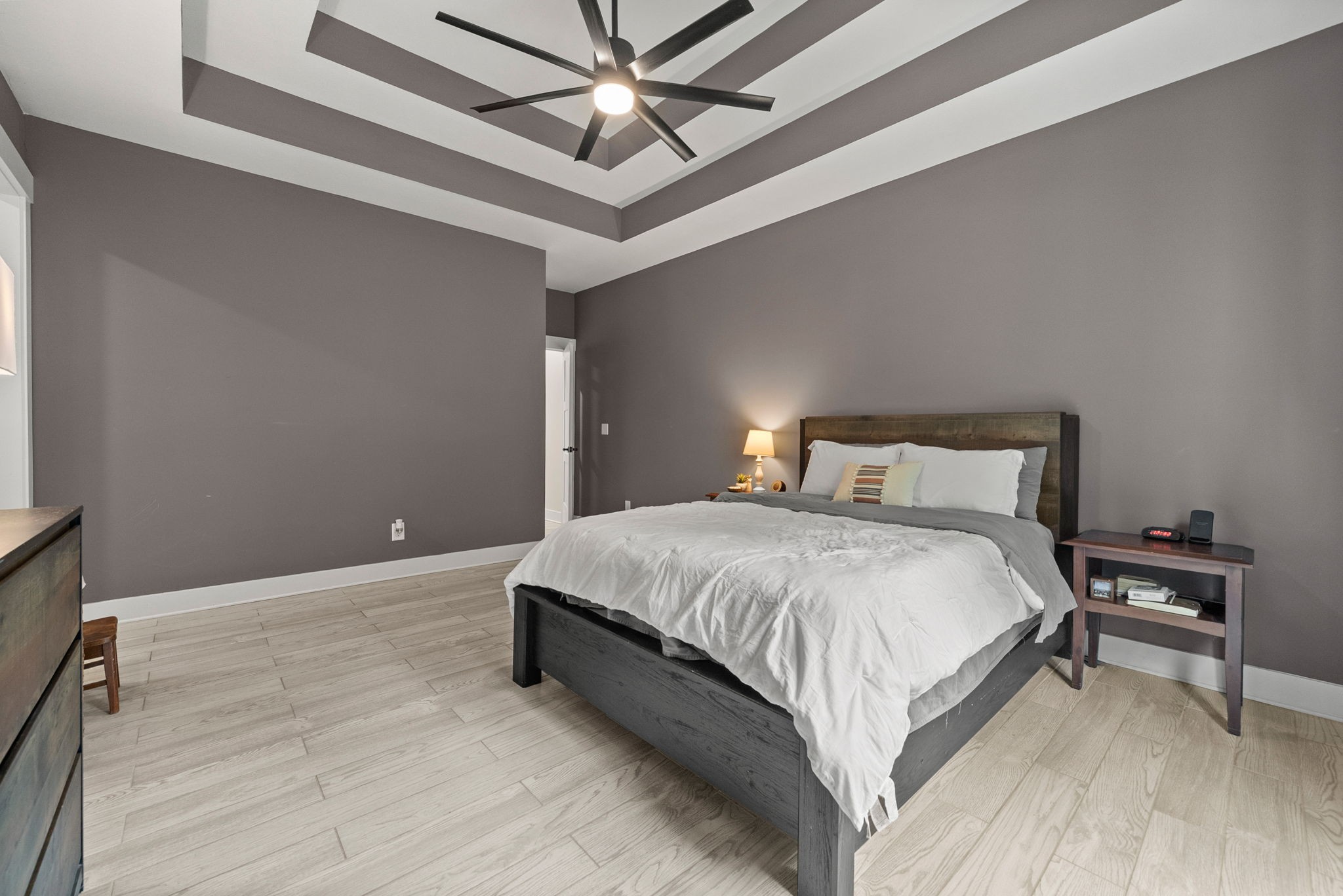 1895 Highway 13 Cunningham, TN 37052 - Photo 14 of 33 a bedroom with a bed and a ceiling fan