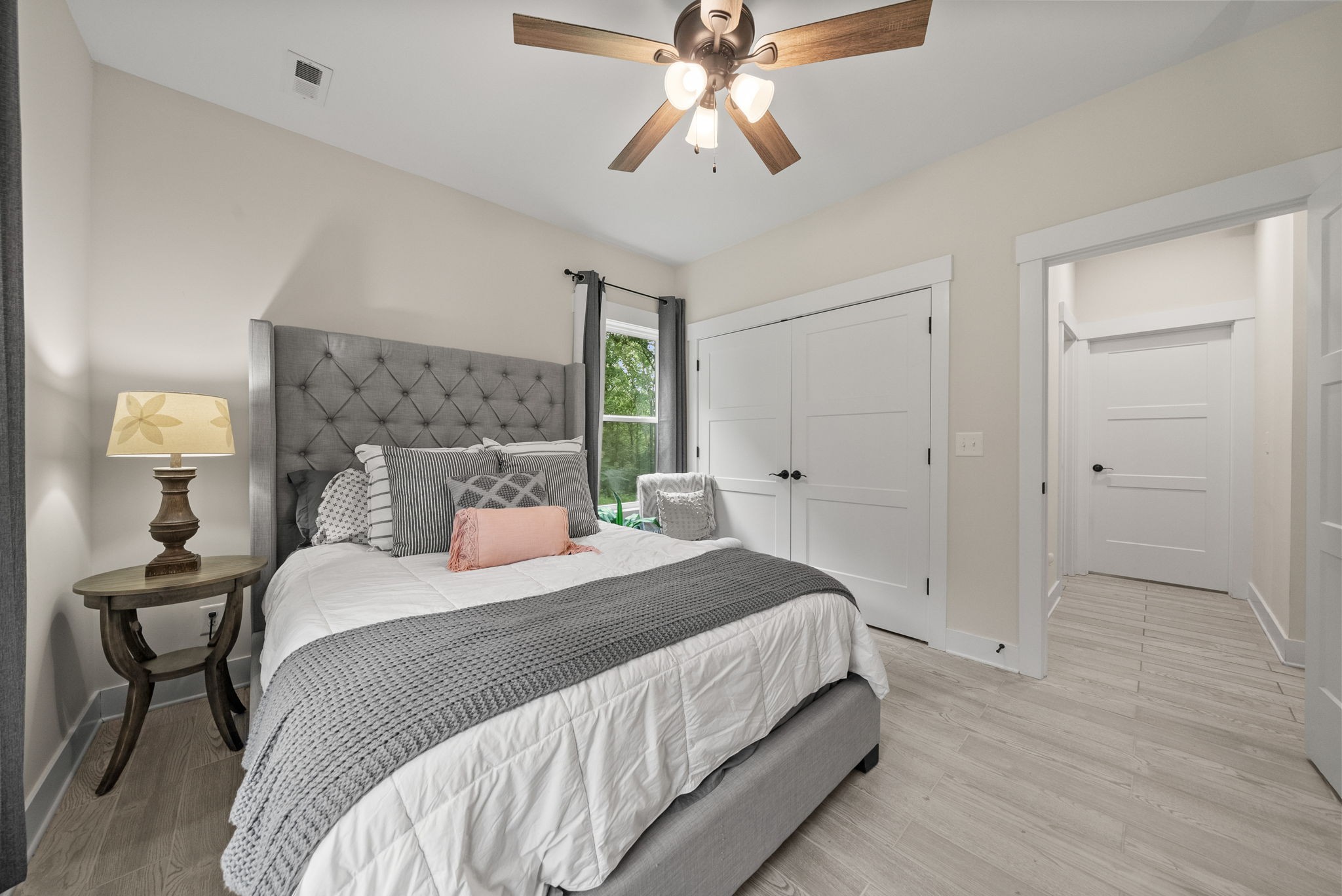 1895 Highway 13 Cunningham, TN 37052 - Photo 20 of 33 a bedroom with a bed and a chandelier