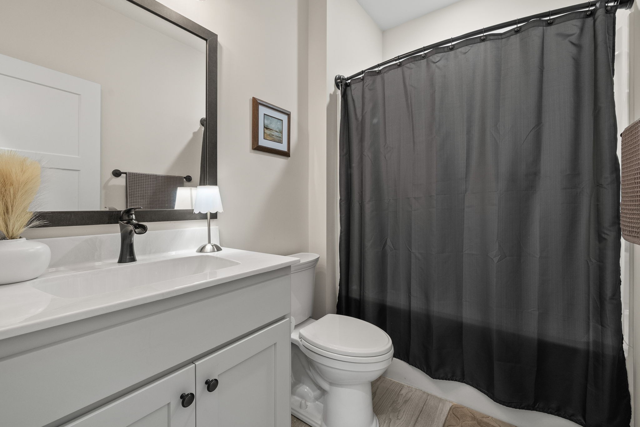 1895 Highway 13 Cunningham, TN 37052 - Photo 21 of 33 a bathroom with a sink a toilet and shower