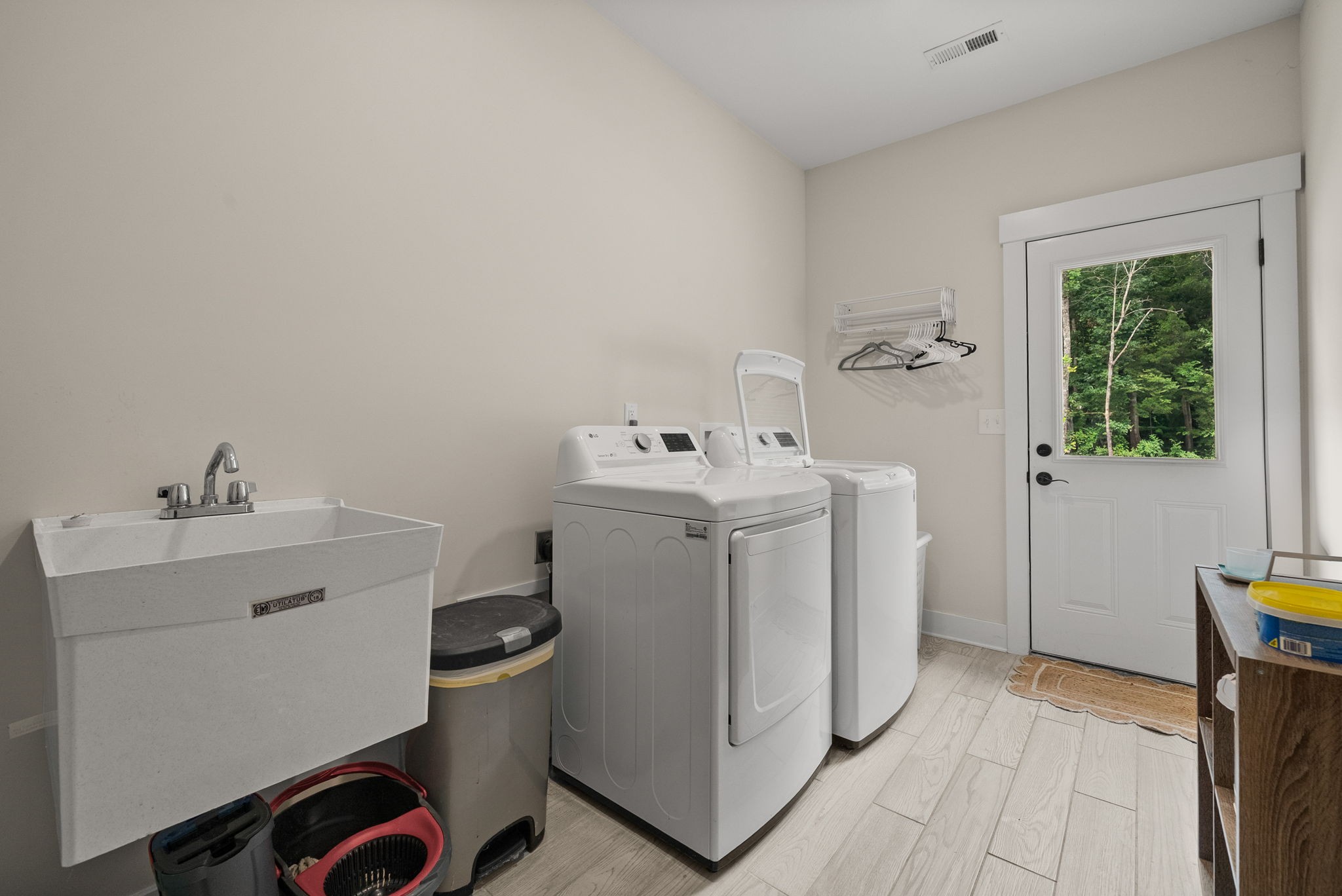 1895 Highway 13 Cunningham, TN 37052 - Photo 22 of 33 a utility room with dryer and washer