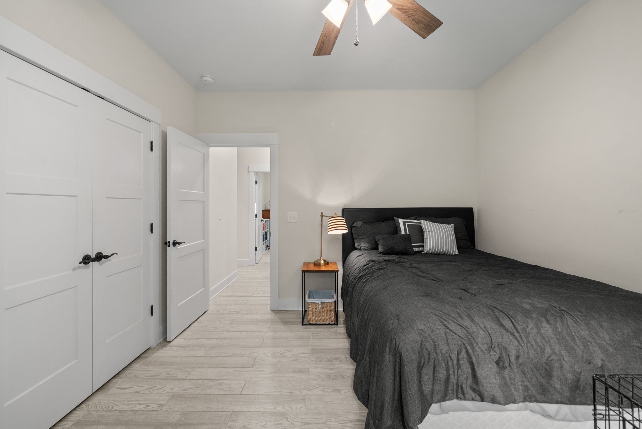 1895 Highway 13 Cunningham, TN 37052 - Photo 24 of 33 a bed room with a bed and a chandelier