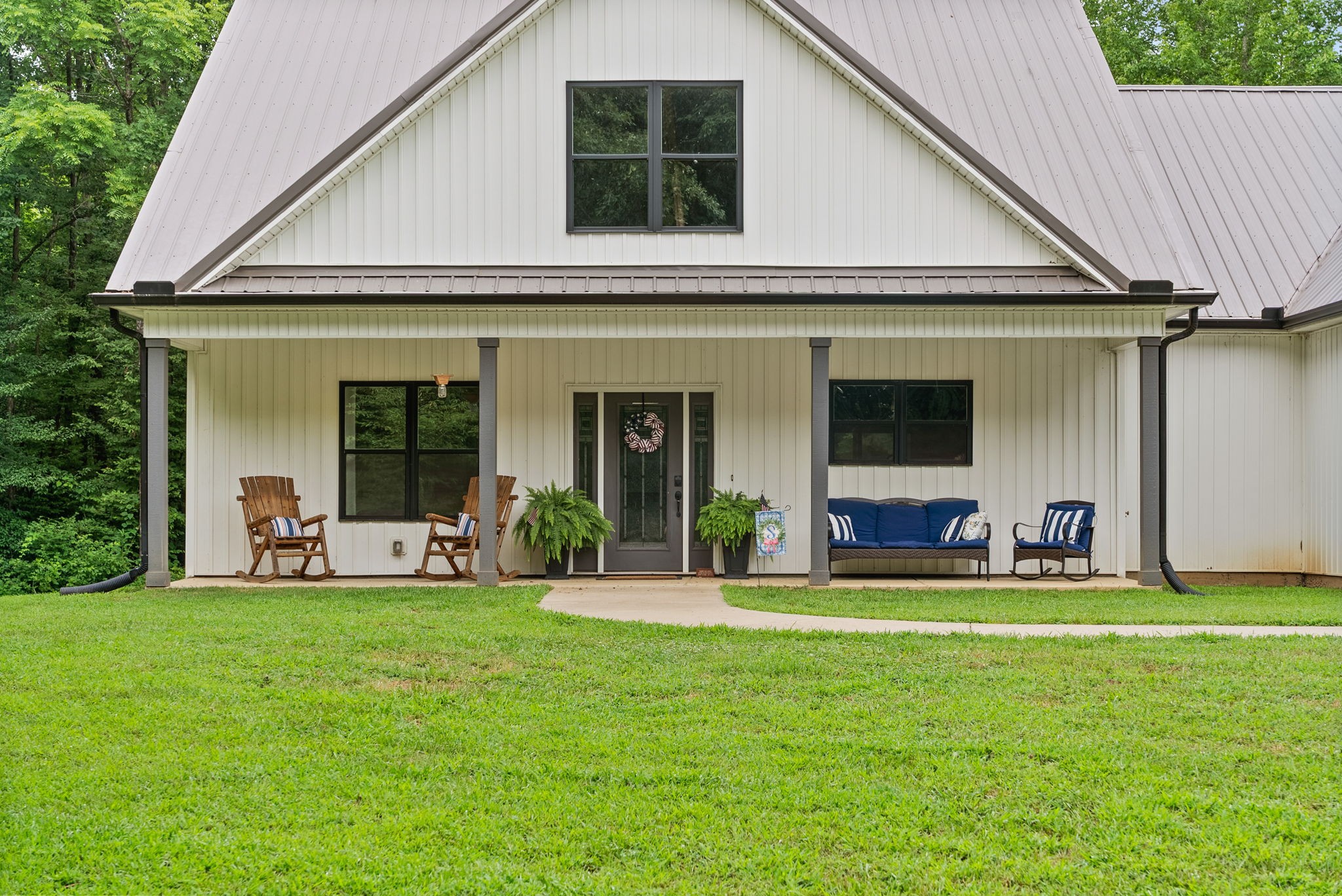1895 Highway 13 Cunningham, TN 37052 - Photo 29 of 33 a front view of a house with swimming pool and porch with furniture