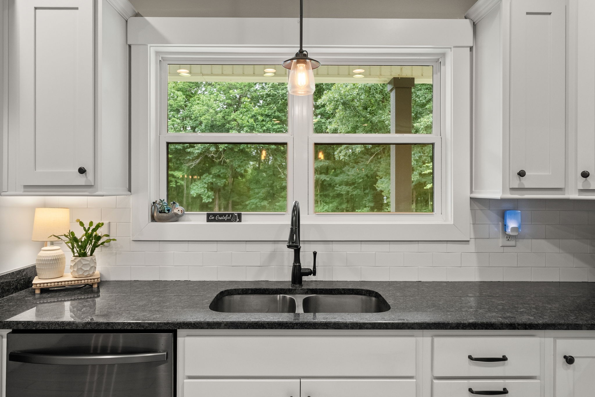 1895 Highway 13 Cunningham, TN 37052 - Photo 6 of 33 a kitchen with granite countertop white cabinets and window