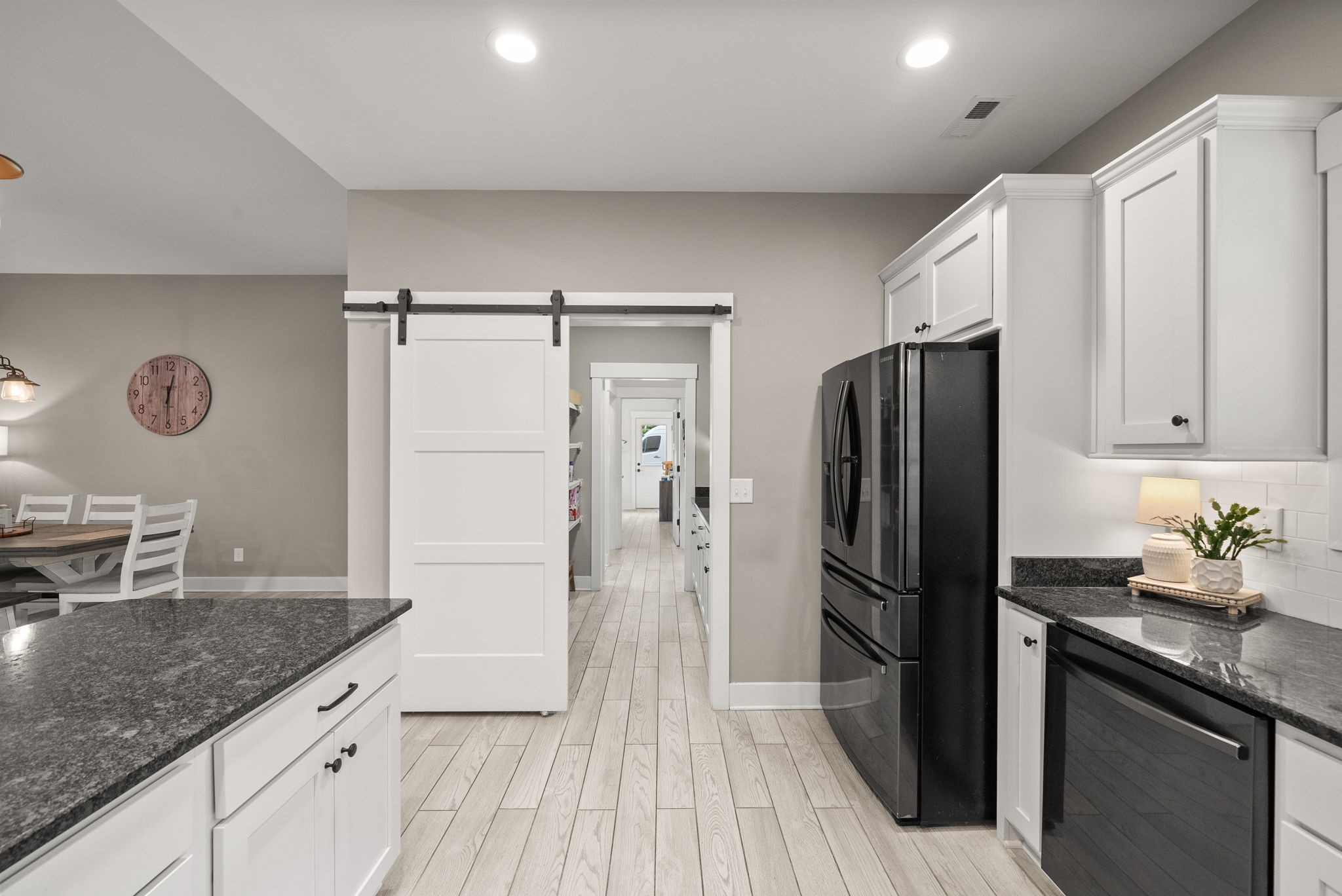 1895 Highway 13 Cunningham, TN 37052 - Photo 7 of 33 a kitchen with granite countertop a refrigerator and a sink