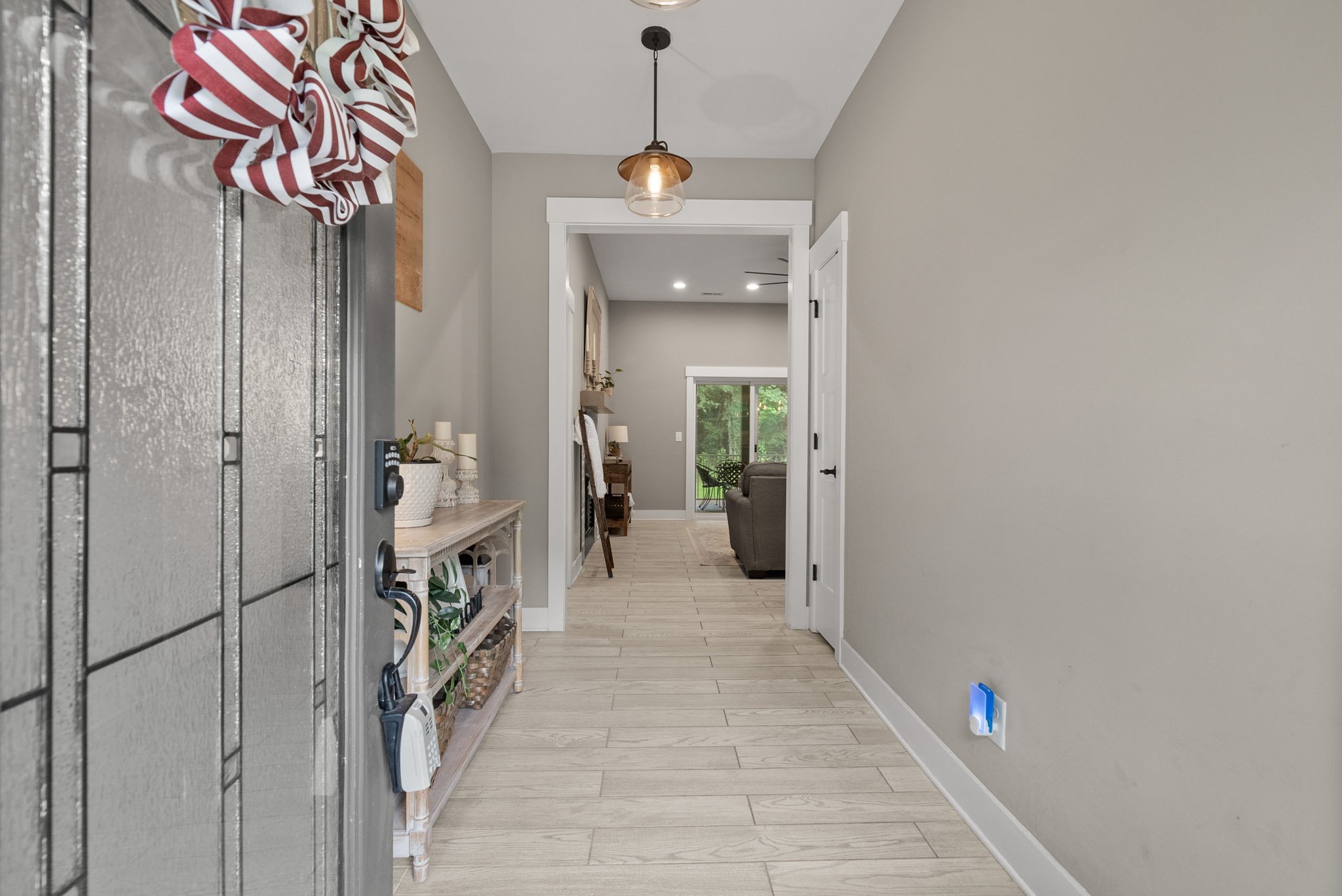 1895 Highway 13 Cunningham, TN 37052 - Photo 9 of 33 a view of a hallway and a livingroom with furniture