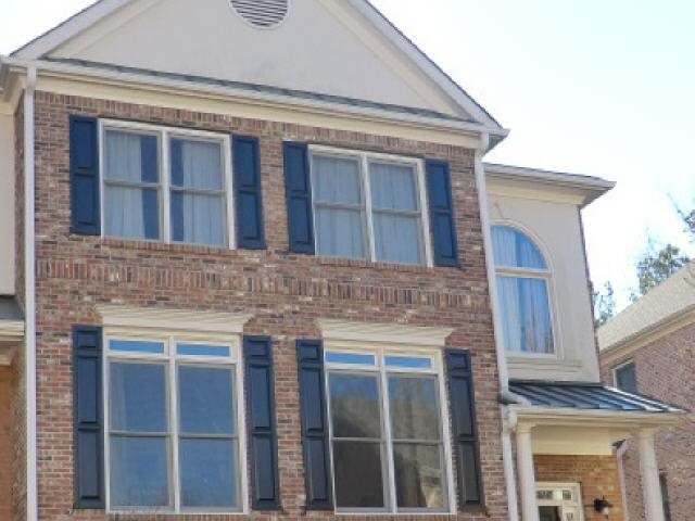 2459 Oak Grove Vista Decatur, GA 30033 - Photo 1 of 1 a front view of a house with a glass door
