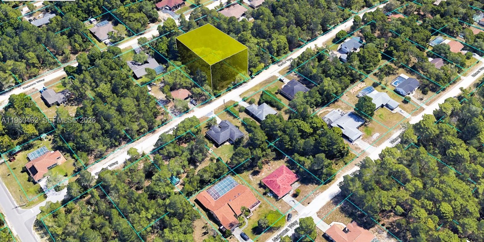 8977 Senior Way Brooksville, FL 34613 - Photo 2 of 5 an aerial view of a house with a yard and swimming pool