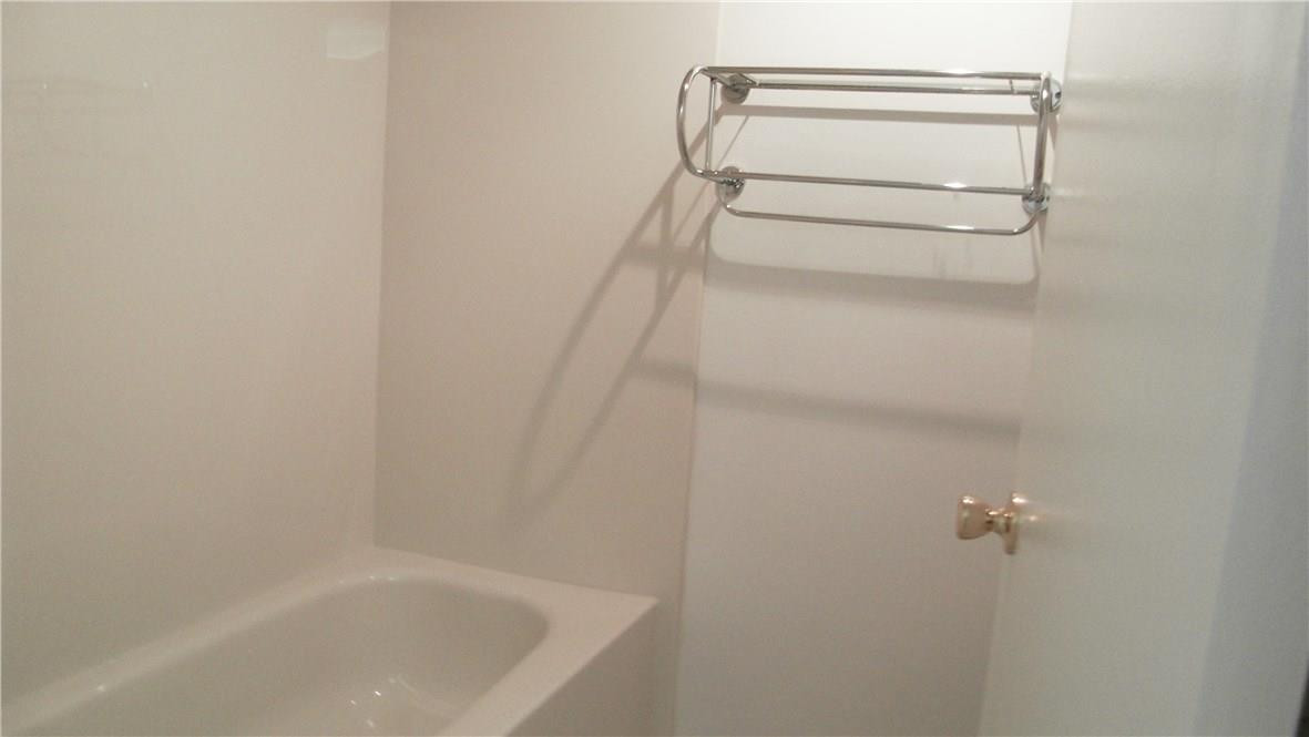 22188 Boca Rancho Drive, Unit D Boca Raton, FL 33428 - Photo 11 of 22 a bathroom with a shower