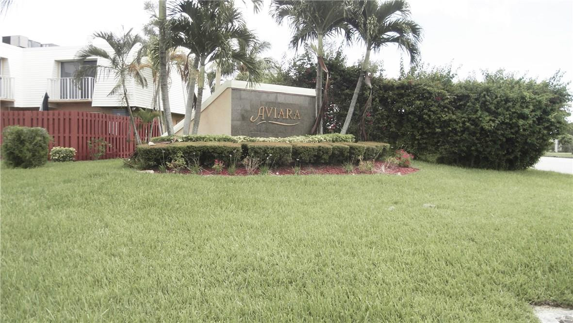 22188 Boca Rancho Drive, Unit D Boca Raton, FL 33428 - Photo 2 of 22 a view of a back yard of the house