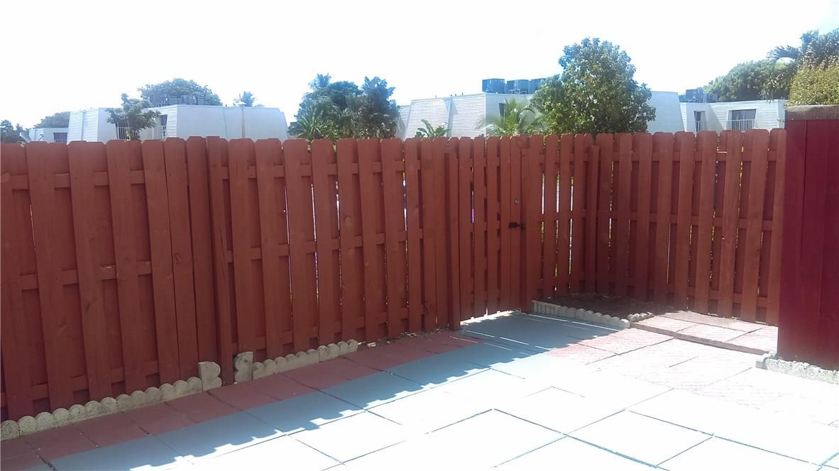 22188 Boca Rancho Drive, Unit D Boca Raton, FL 33428 - Photo 4 of 22 a view of outdoor space with wooden fence