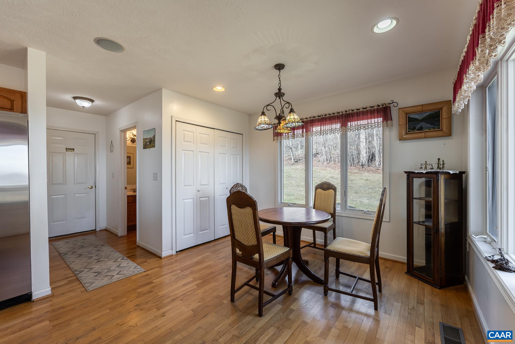654 Saddleback Road Stanardsville, VA 22973 - Photo 14 of 75 a dining room with furniture and window