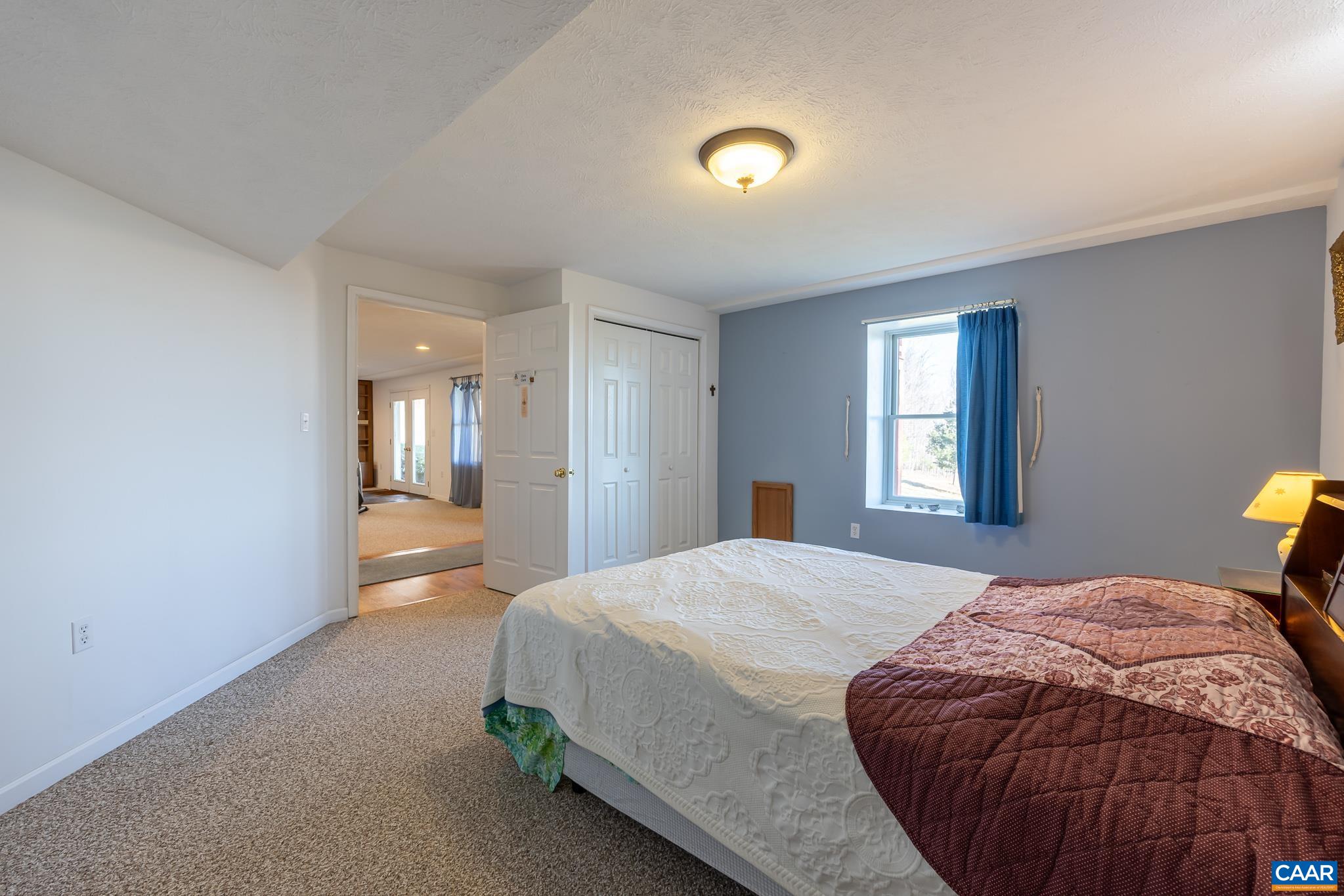 654 Saddleback Road Stanardsville, VA 22973 - Photo 43 of 75 a bedroom with a bed and window